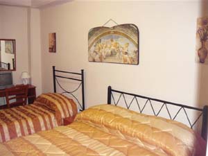 Basic triple and 1 child with city view, balcony, and private facilities